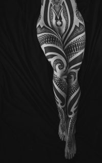 Womans Leg And Torso Blackwork Tattoo