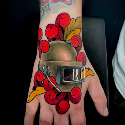 Color Tattoo Of Mask On Hand