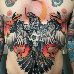 Crow And Skull Chest Tattoo