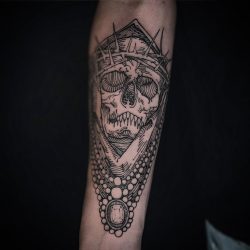 Skull With Thorns Tattoo