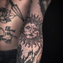 Sun Tattoo On Mens Forearm
