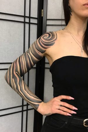 Woman Simple And Astonishing Arm Sleeve Tattoo